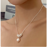 Multi Ring Pearl Necklace