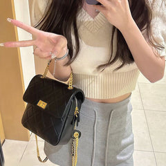 Metal Lock Quilted Backpack Bag