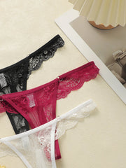 3 pairs of multi colored lace low waisted Thongs