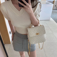 Metal Lock Quilted Backpack Bag